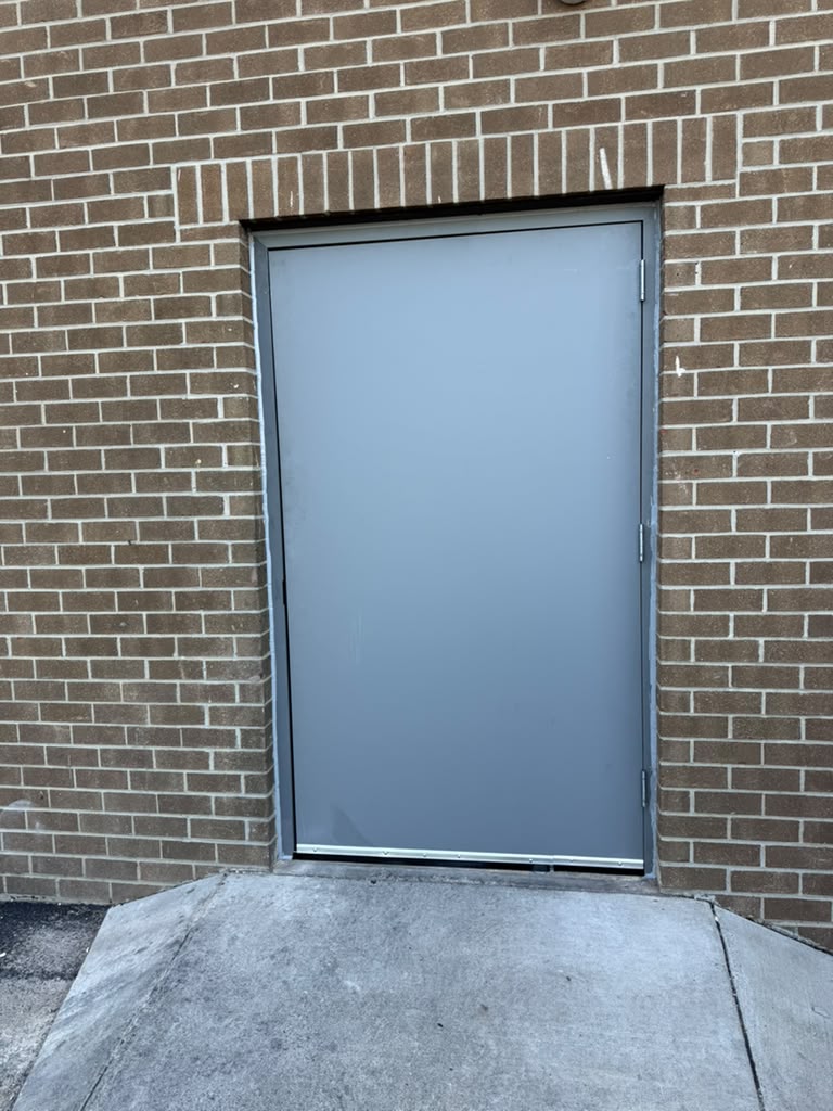 Repaired commercial hollow metal door after repair, Alexandria VA