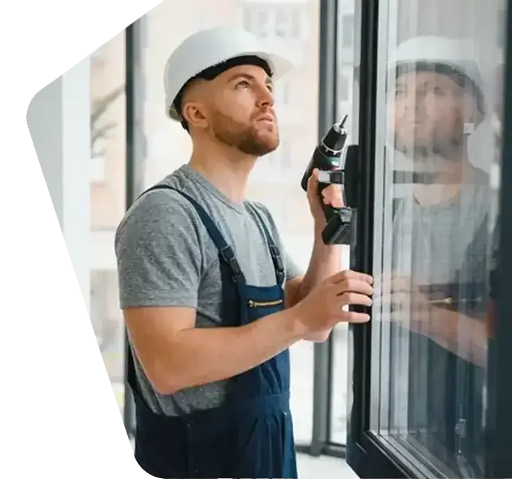 Meet the Team US Glass Repair technician installing a window